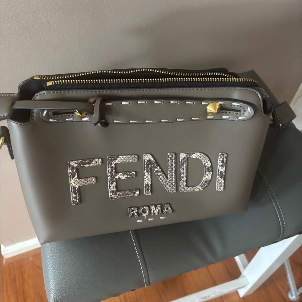 Like new bag in taupe color and